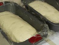 Left, 70% dough; right, 80% dough; both are in bread pans